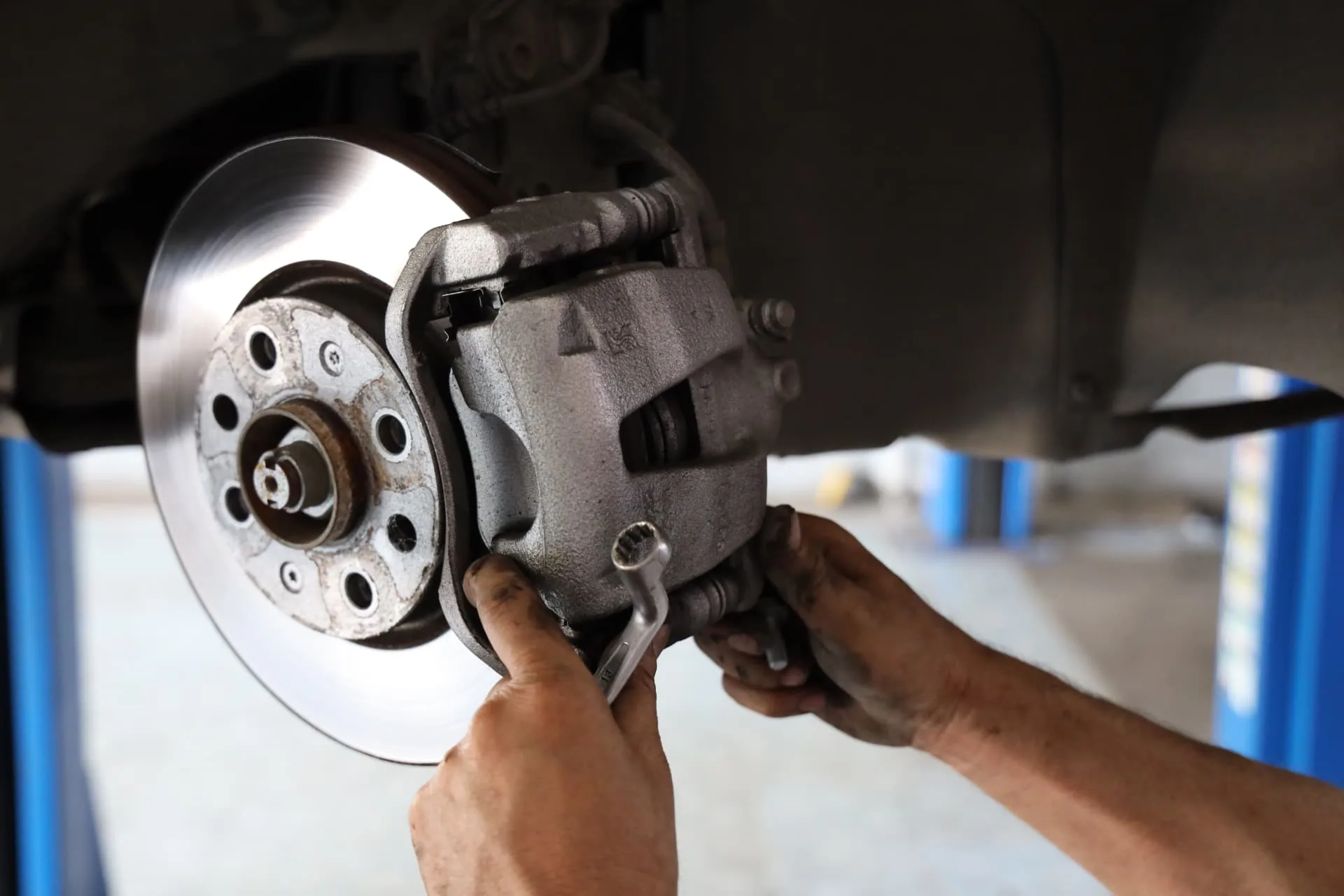 Brake rotor and caliper on a lifted vehicle