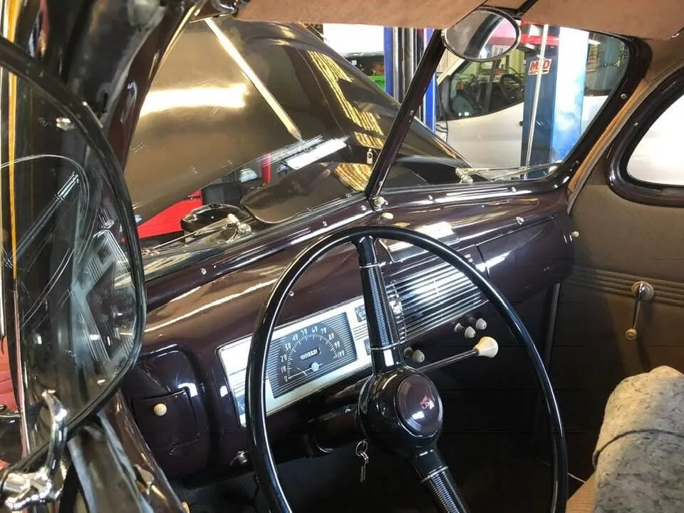 Classic car dashboard and steering wheel during repair in West Columbia, SC