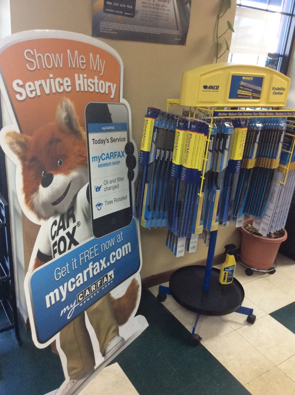 Carfax service history sign and wiper blade display in the lobby in West Columbia, SC